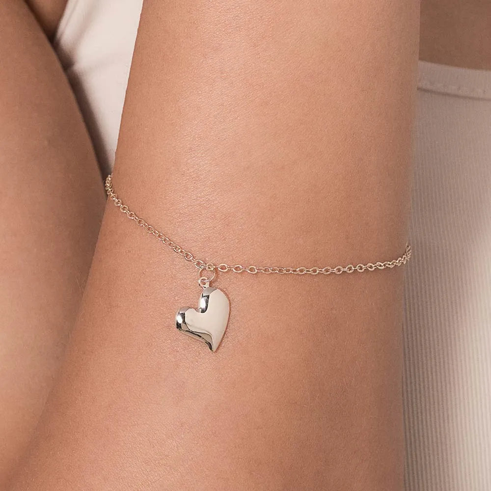 PULSEIRA COM PINGENTE DE CORAÇÃO BANHADA A OURO 18K - TAM.19 5521811900